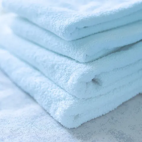 Neatly folded towels and clothes