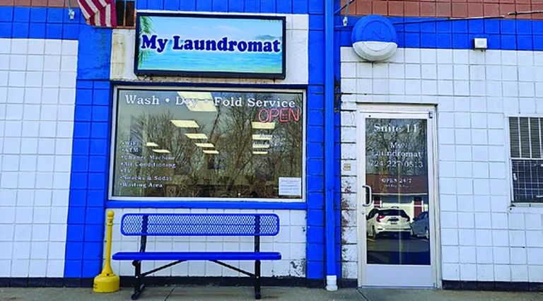 My Laundromat storefront with blue and white tile, around the back of Essex Plaza in Imperial, PA