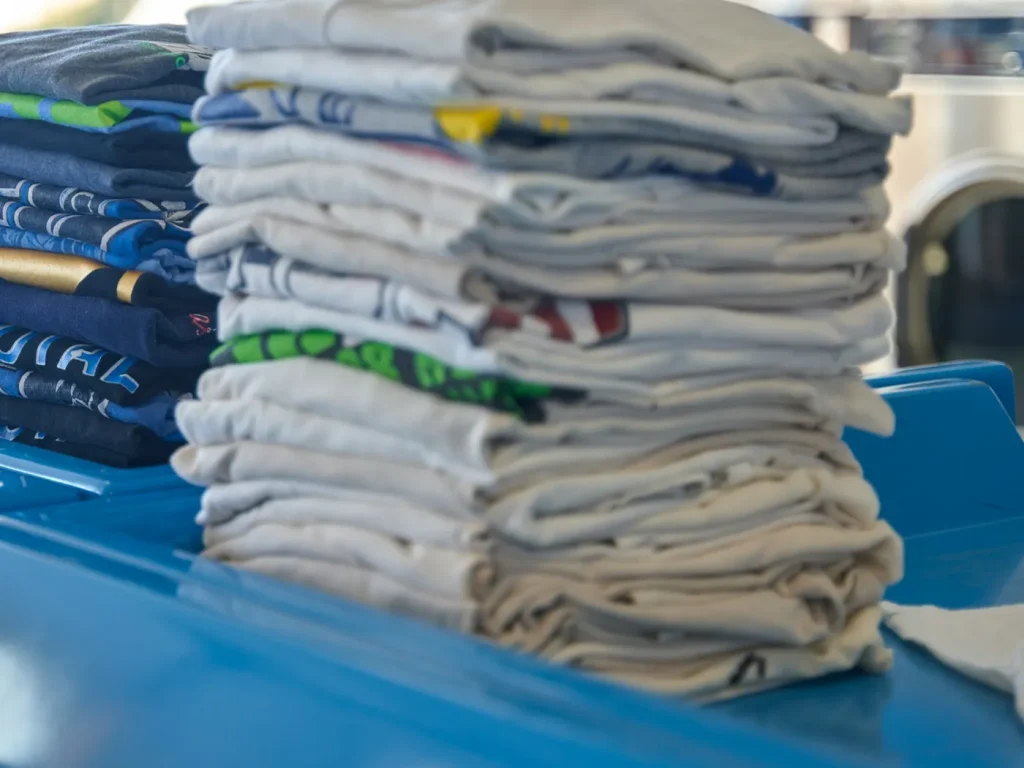 Stacks of neatly folded clean laundry